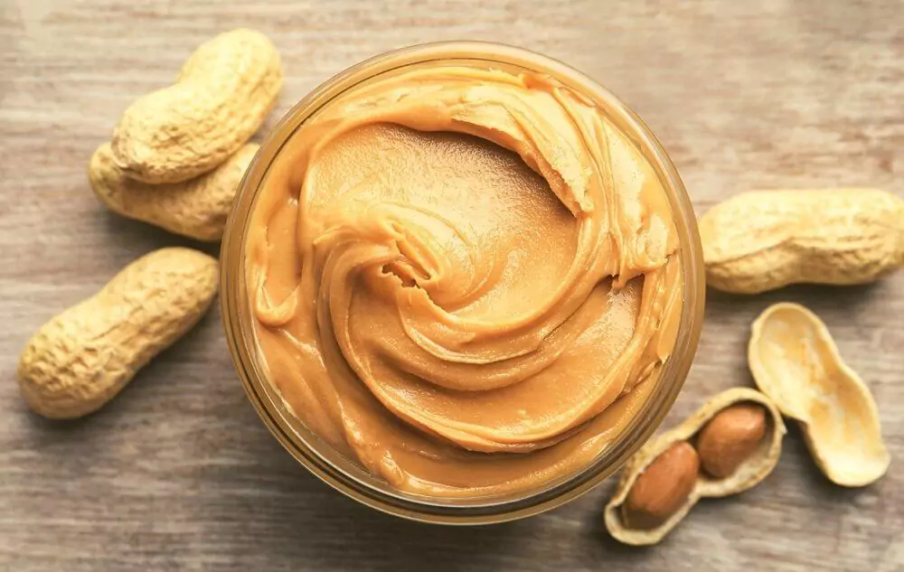 is almond butter healthier than peanut butter