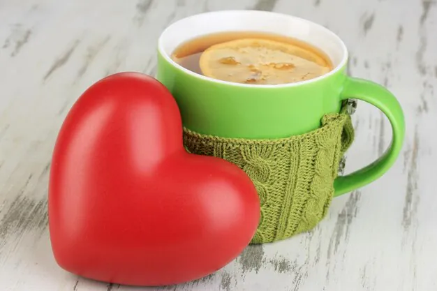 a heart-shaped piece placed against the tea cup.