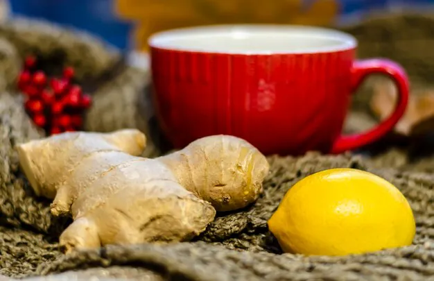 ginger with lemon and bowl placed at the side.