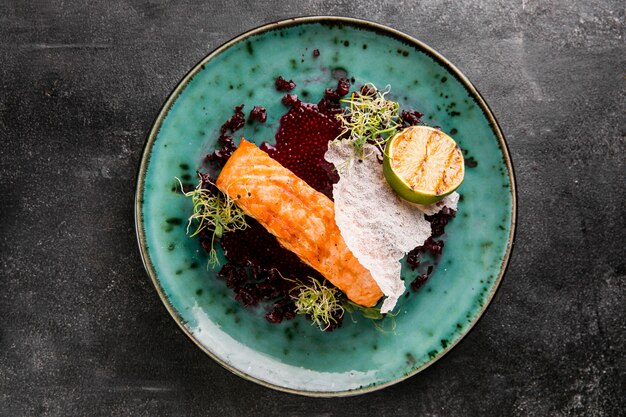 cooked salmon in a flat plate